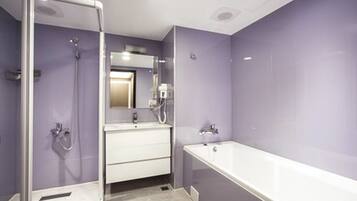 Shower, hair dryer, slippers, towels