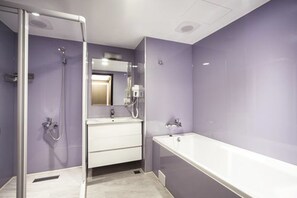 Shower, hair dryer, slippers, towels