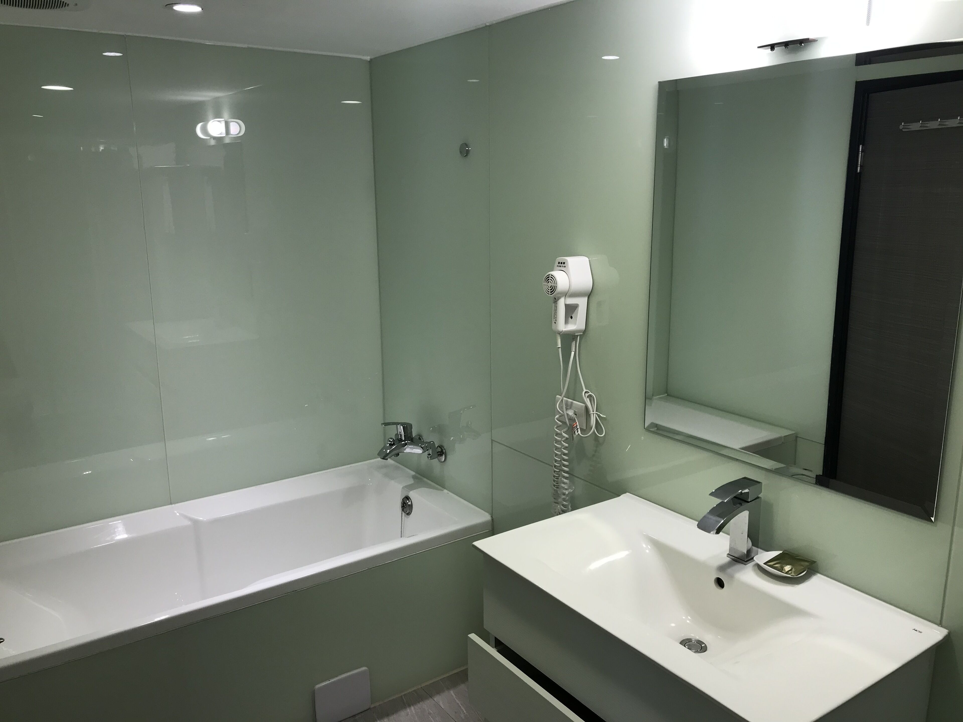 executive family room  | bathroom | shower, hair dryer, slippers, towels