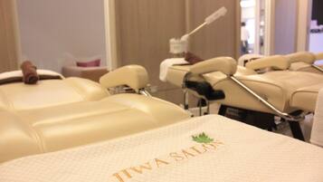 Relax and unwind with a massage on the in-room table, complete with a headrest and footrest.