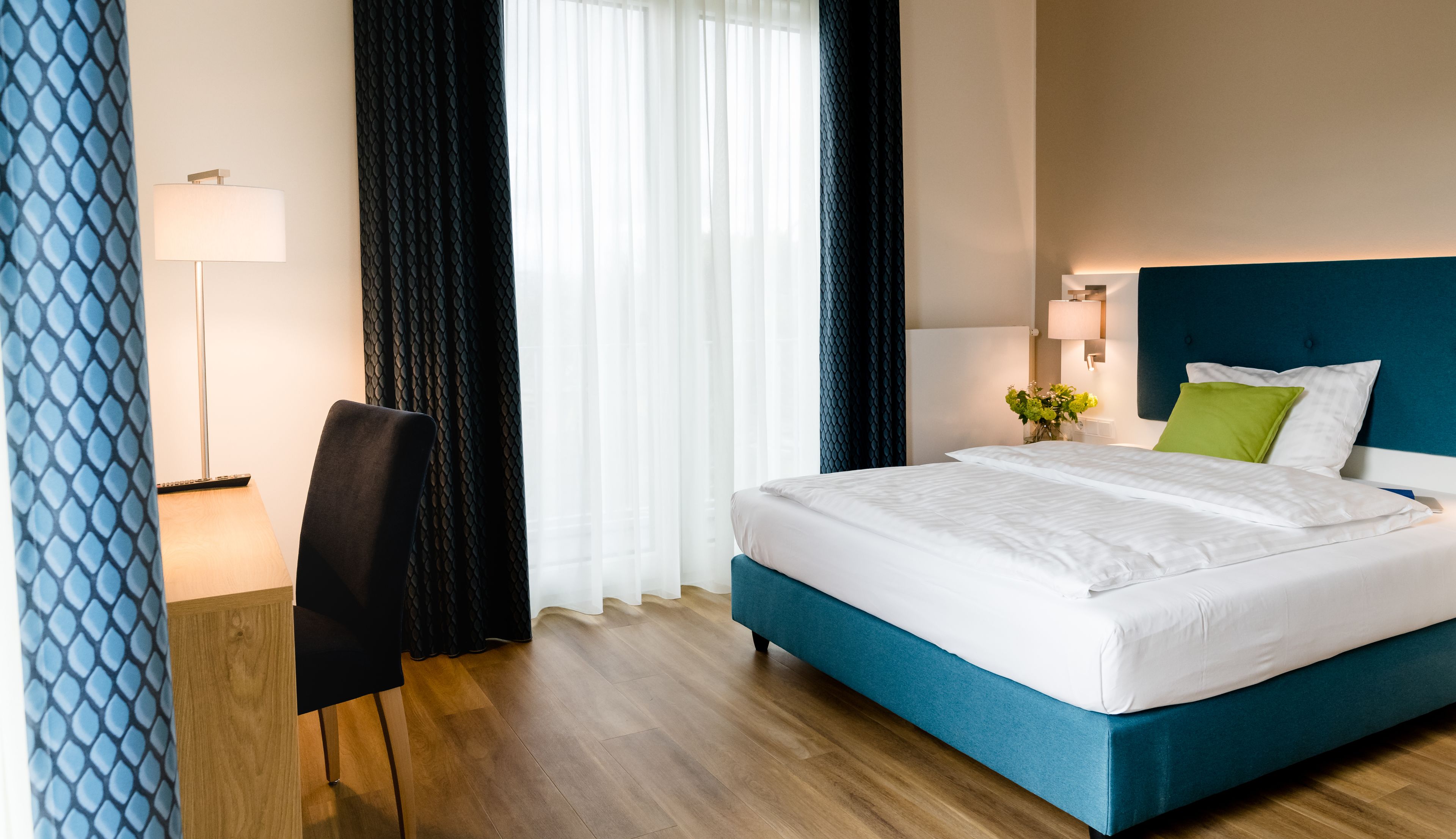 hypo-allergenic bedding, individually furnished, desk, laptop workspace