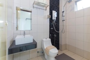 Shower, rainfall showerhead, bidet, towels