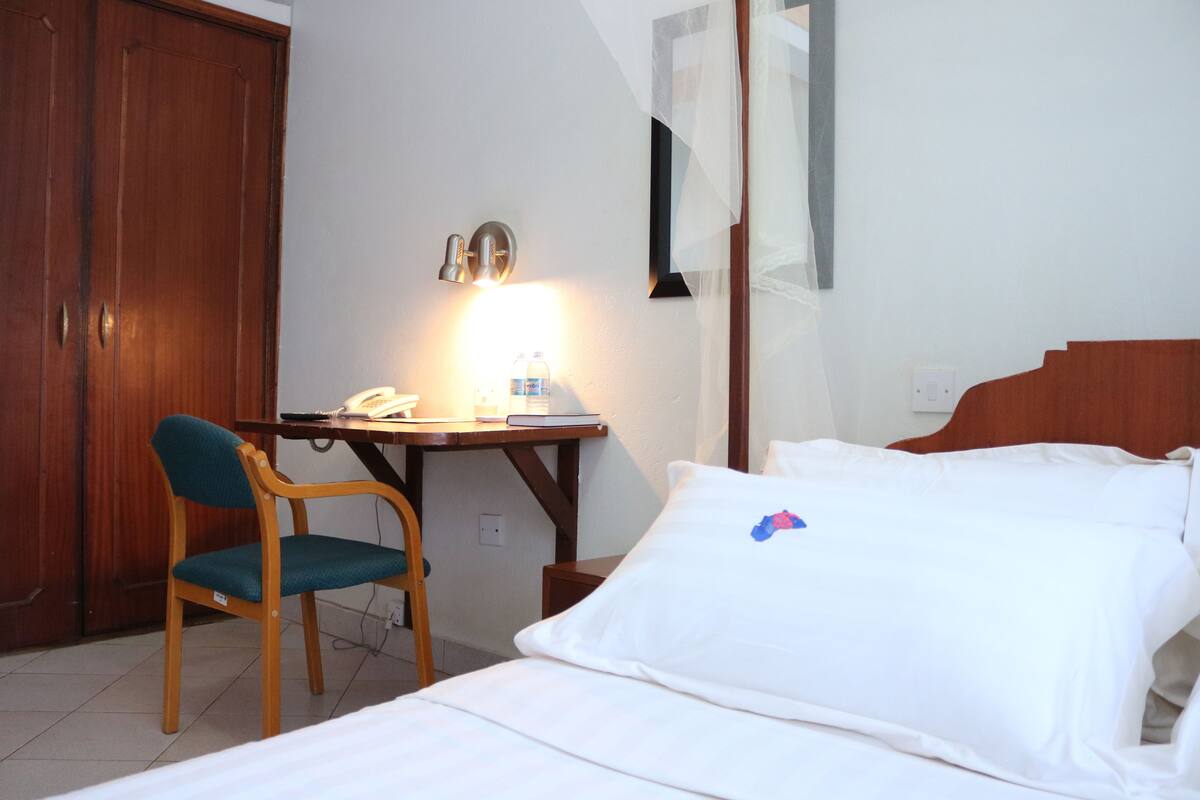 Desk, free WiFi, bed sheets