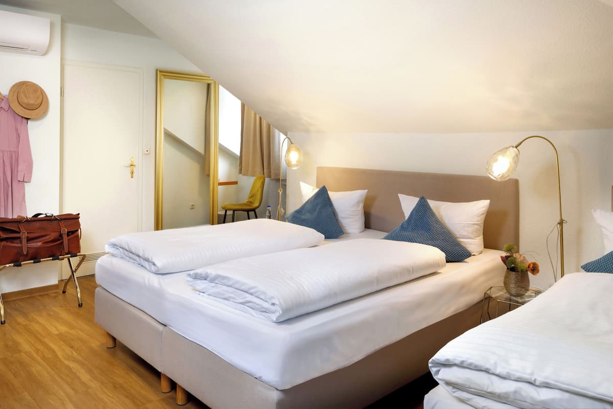 quadruple room | 1 bedroom, premium bedding, in-room safe, desk