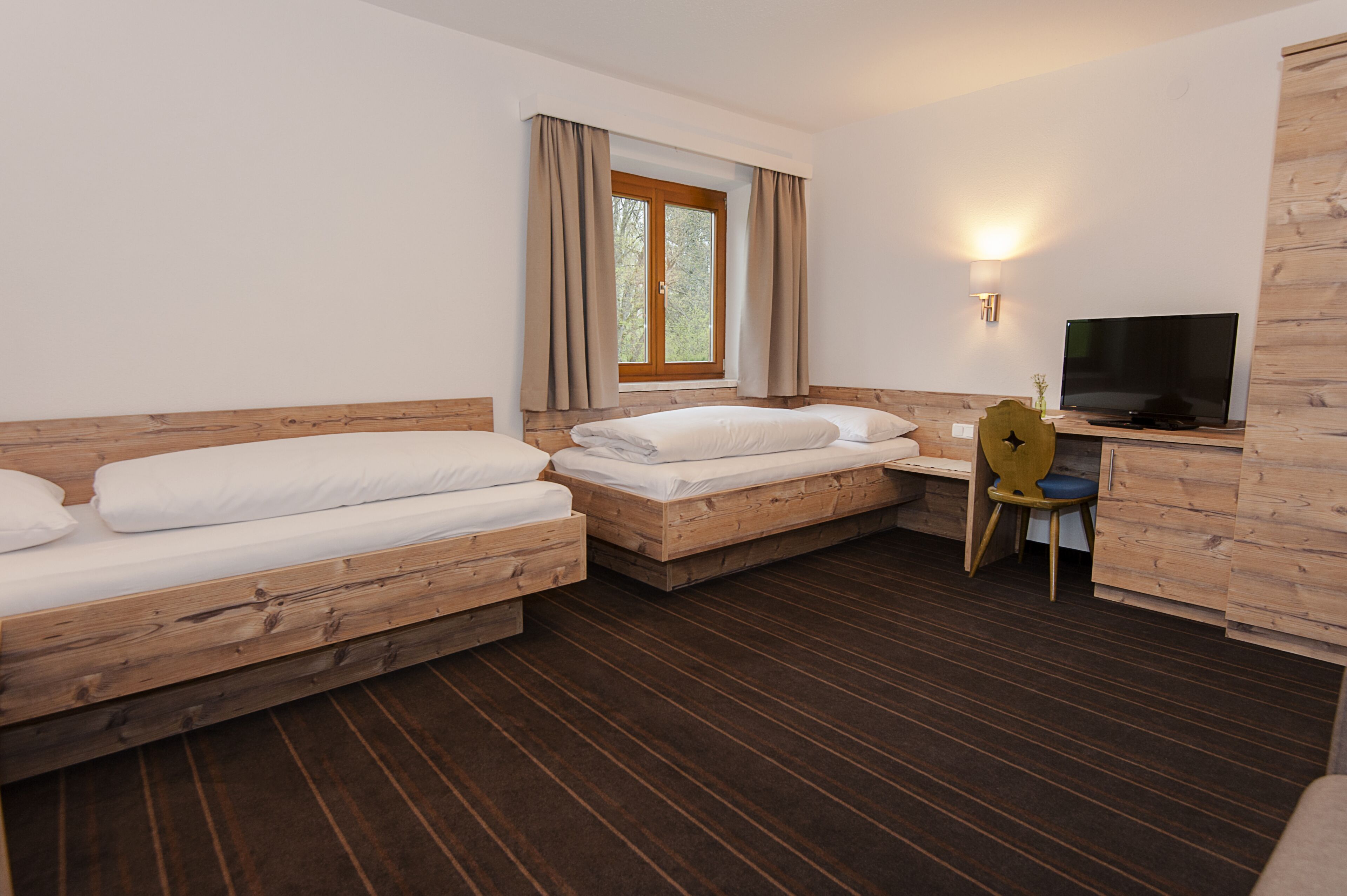 Quadruple Room | Living area | Flat-screen TV