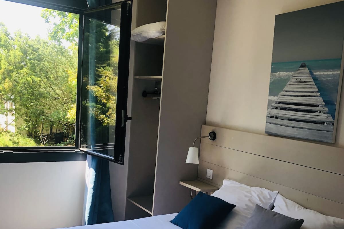 Double Room, Garden View | In-room safe, individually decorated, individually furnished, desk