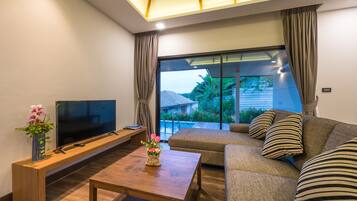 Family Pool Villa | Minibar, in-room safe, blackout drapes, soundproofing