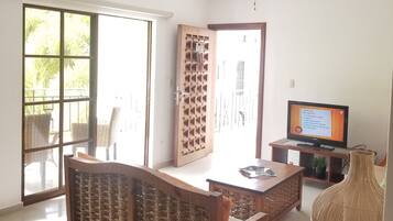 Comfort Apartment, 2 Queen Beds, Smoking, Garden View | Living area | Flat-screen TV