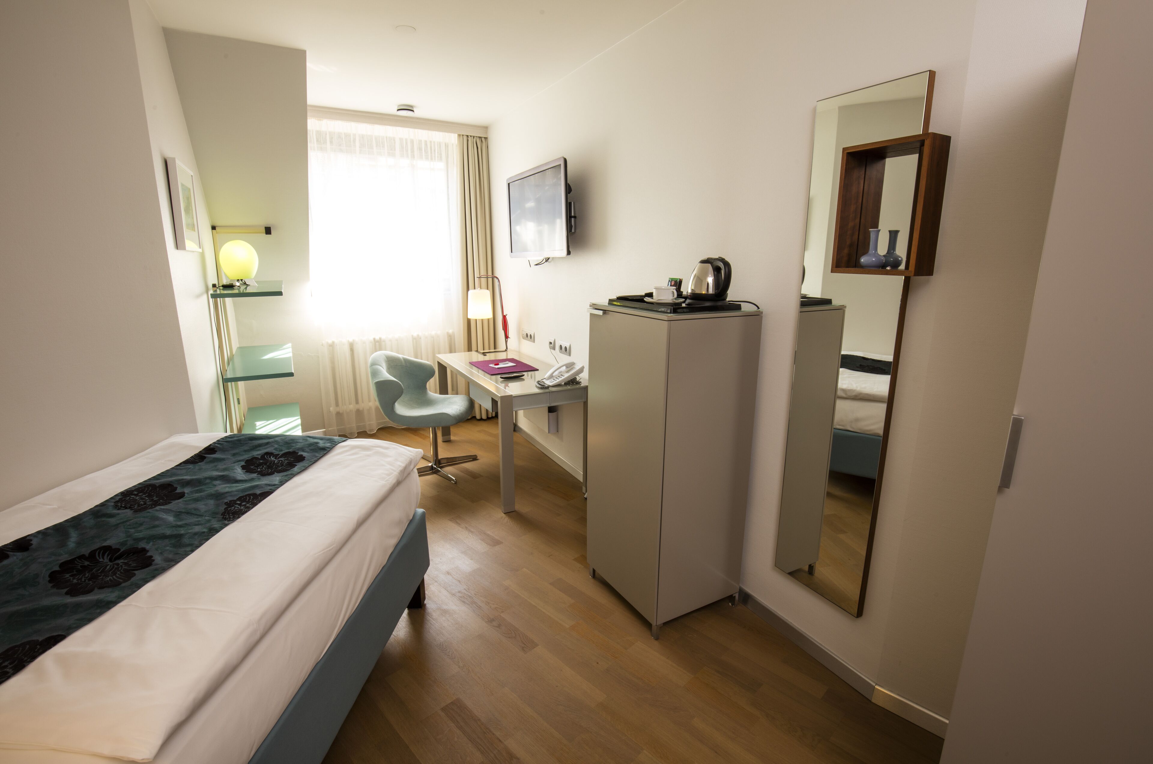 standard single room | minibar, desk, laptop workspace, iron/ironing board