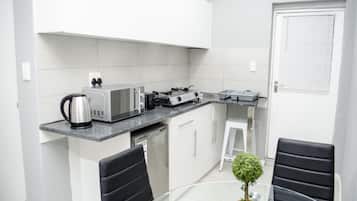 Apartment | Private kitchenette | Fridge, microwave, stovetop, electric kettle