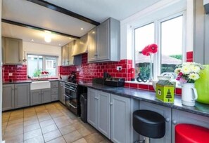 Chambre Double Deluxe | Cuisine partagée