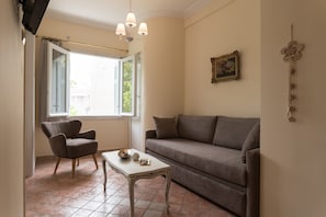 Luxury Apartment (Hermes) | Living room | Flat-screen TV, iPod dock