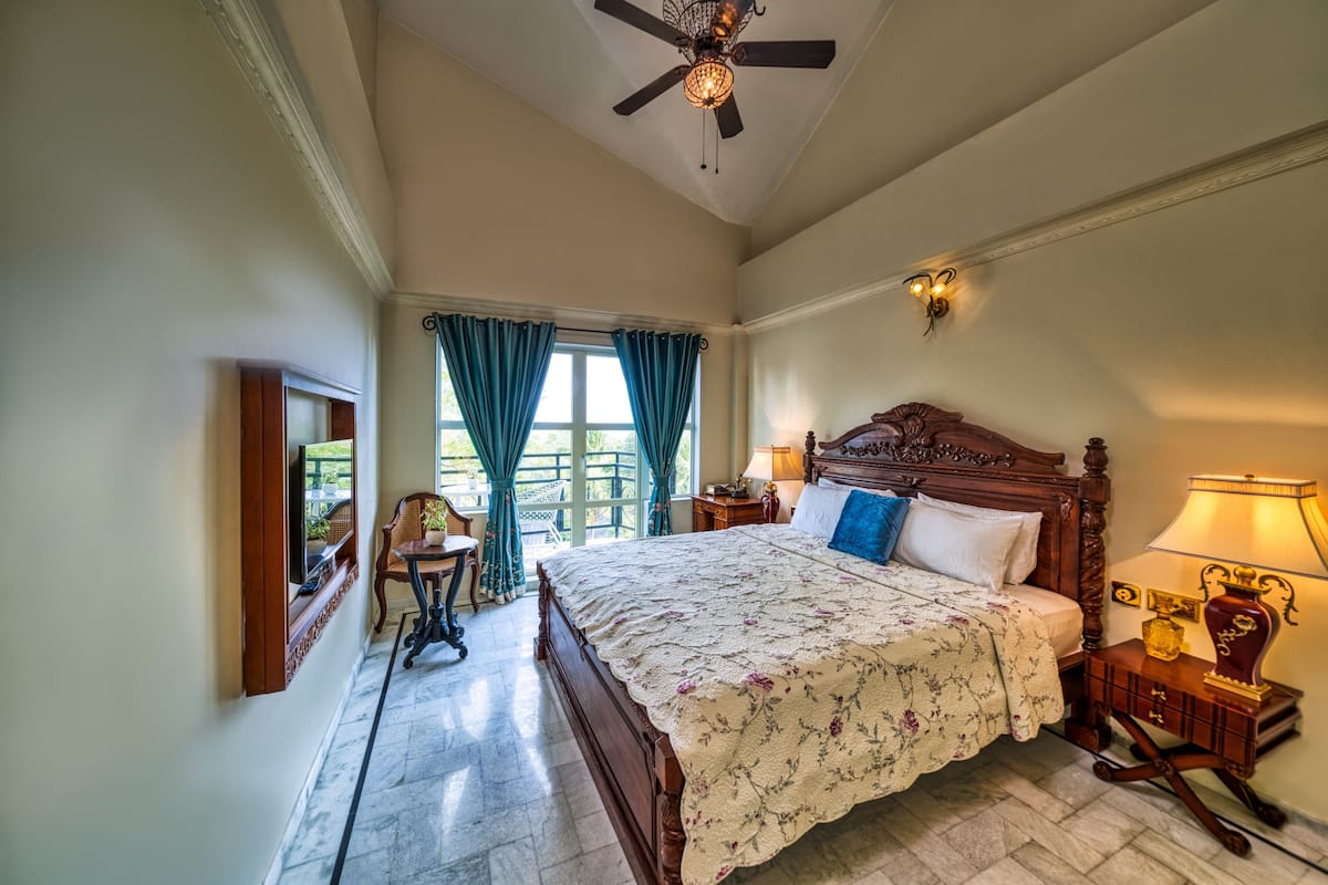 Emerald Suite | Individually decorated, individually furnished, desk, laptop workspace