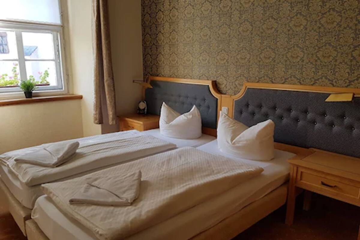 triple room | bed sheets