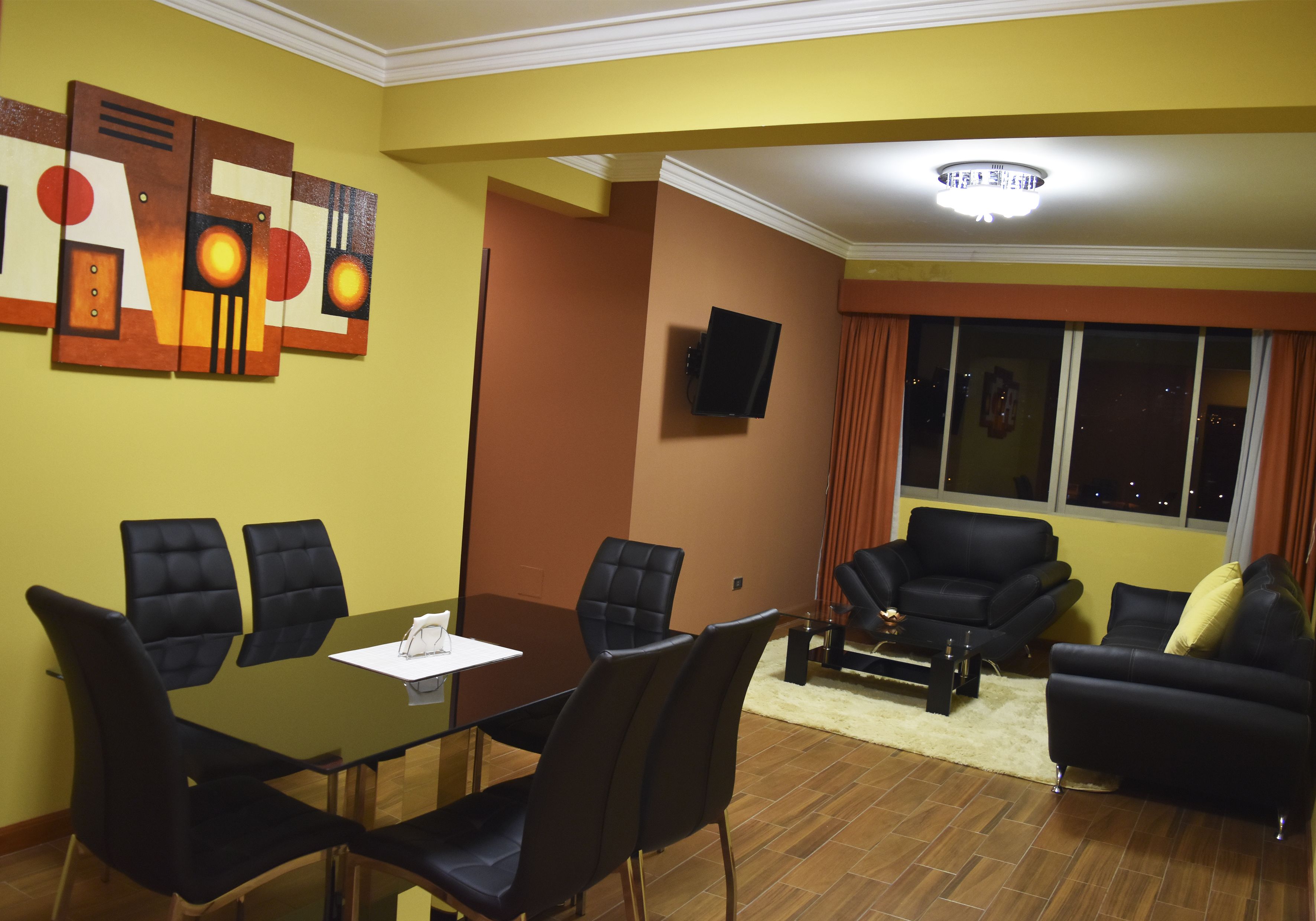 deluxe apartment, 2 bedrooms, accessible, non smoking | living room | 55-inch flat-screen tv with cable channels, tv