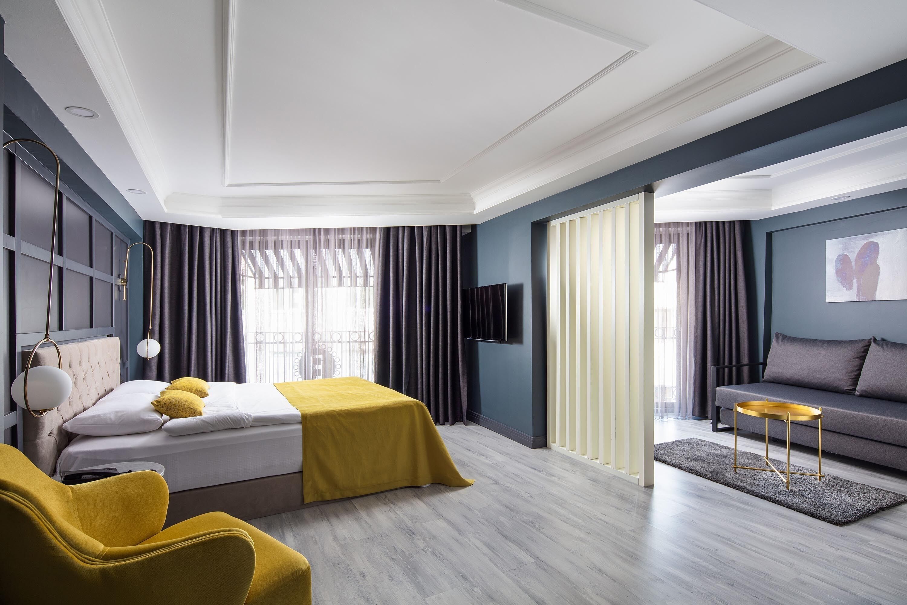 family room | 1 bedroom, minibar, in-room safe, desk