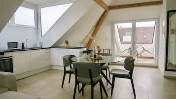 Superior Apartment, 1 Bedroom, Kitchen (incl. cleaning fee of 120 CHF) | Private kitchen | Fridge, microwave, oven, stovetop