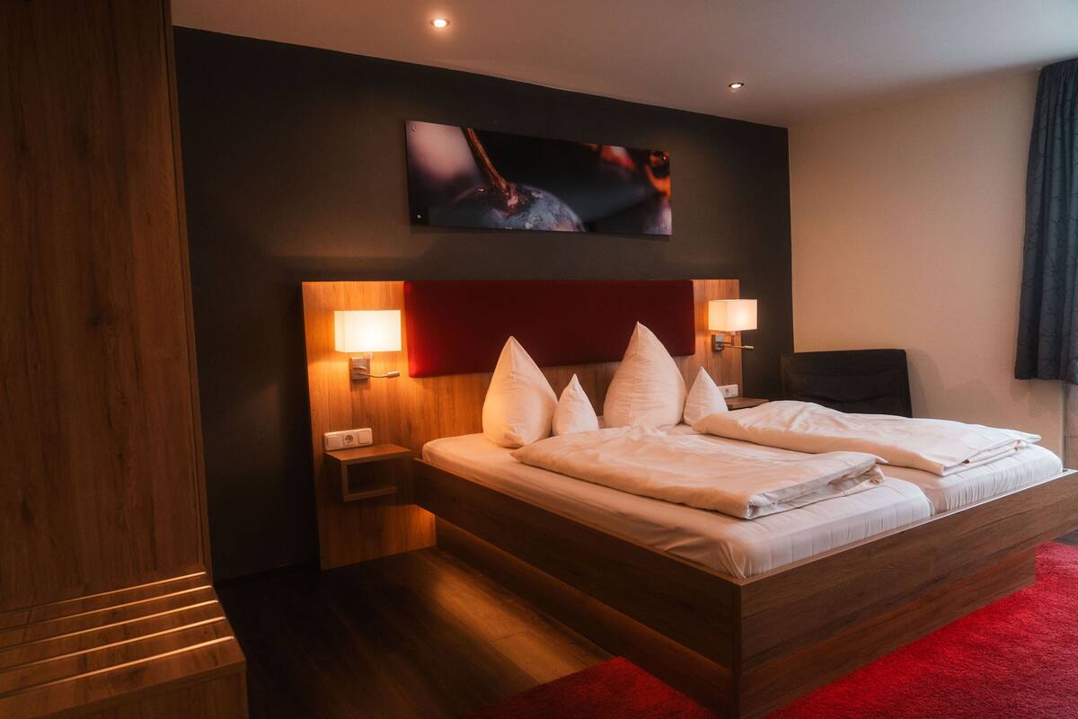 hypo-allergenic bedding, desk, blackout curtains, soundproofing