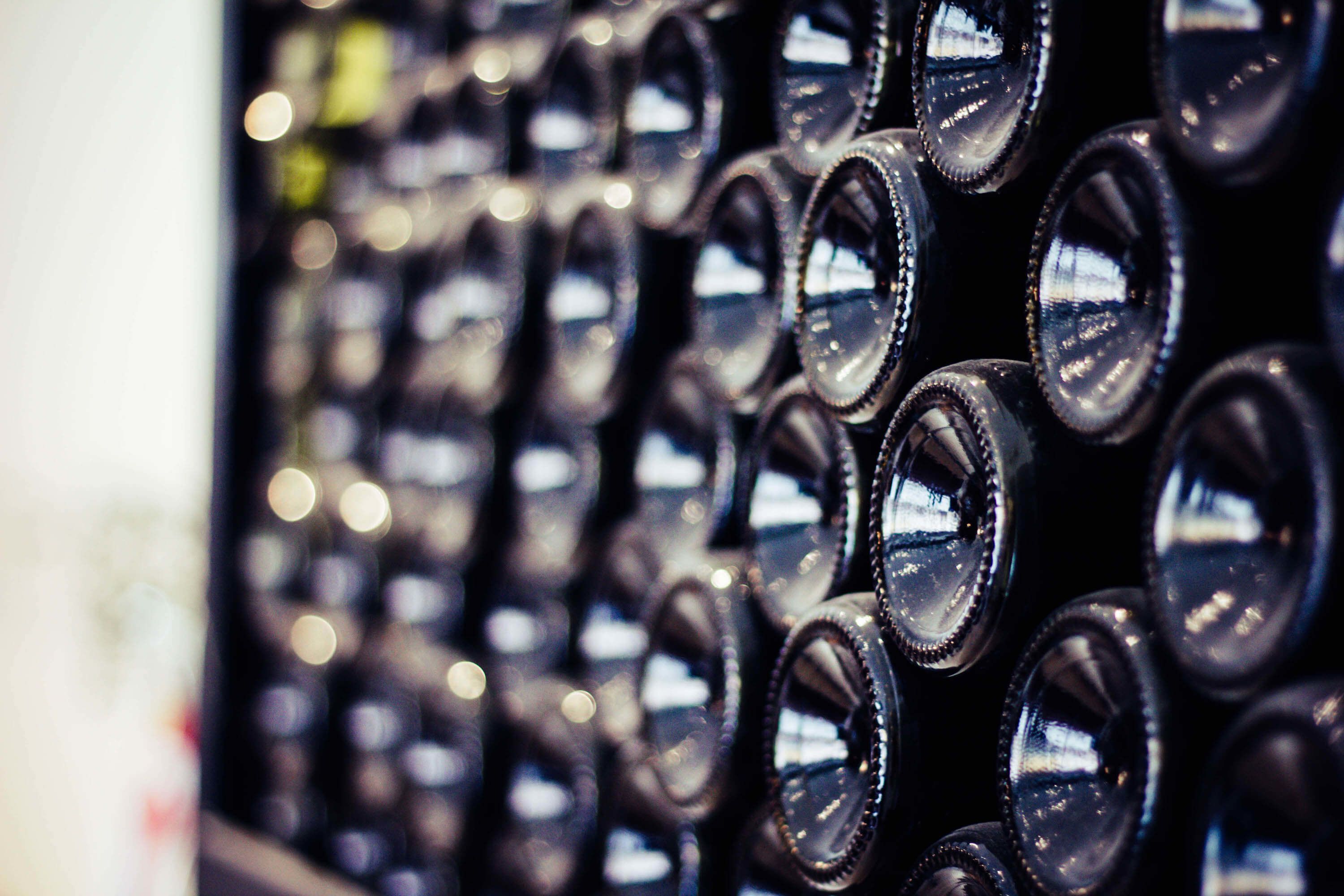 A close-up of multiple circular objects, likely mirrors, arranged in rows.