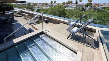 Outdoor pool, open 11:30 AM to 8:00 PM, sun loungers