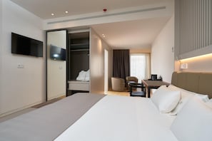 Premium bedding, down duvets, minibar, in-room safe