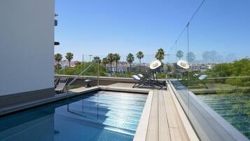 Outdoor pool, pool loungers