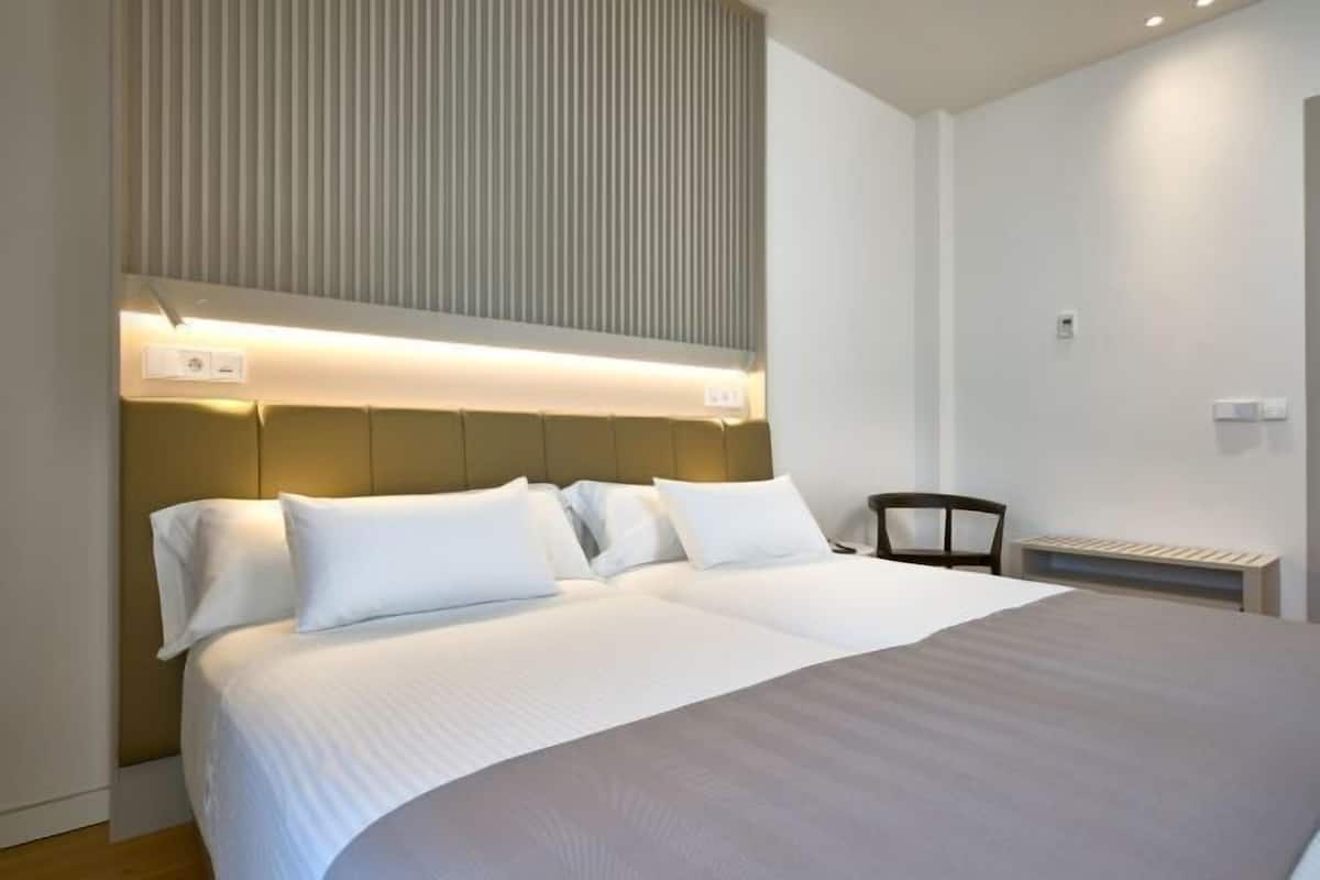 Premium bedding, down duvets, minibar, in-room safe