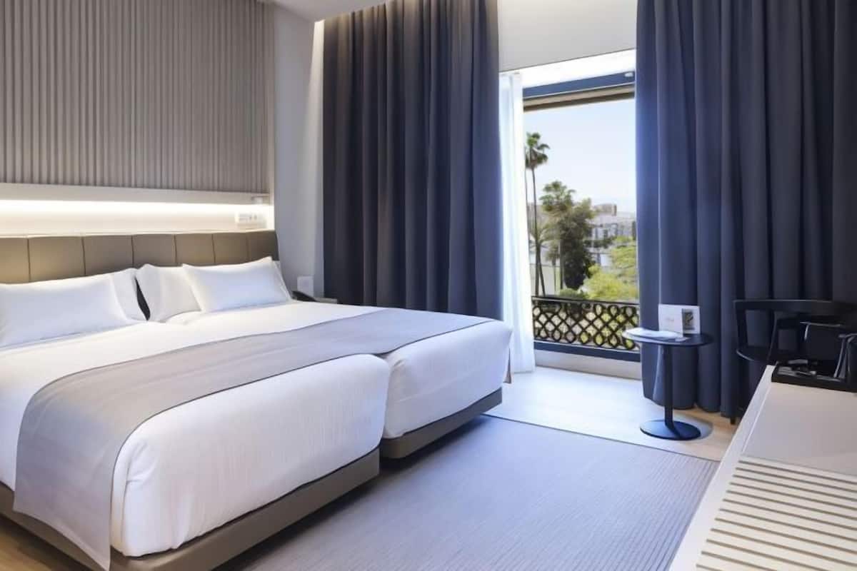 Premium bedding, down duvets, minibar, in-room safe