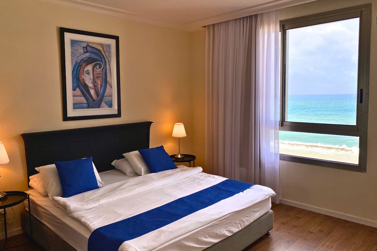 Deluxe Apartment, 1 Bedroom, Sea View, Beachfront | 2 bedrooms, individually decorated, individually furnished, free WiFi