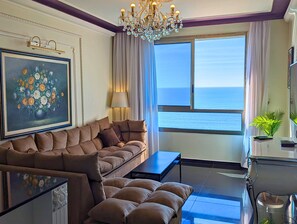 Suite exclusiva, 1 habitación, vistas al mar, frente a la playa | Decoración individual, mobiliario individual, wifi gratis y ropa de cama