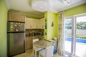 Villa, 4 Bedrooms | Private kitchen | Full-size fridge, microwave, oven, stovetop - Villa Alfiya (Kas)