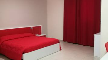 Frette Italian sheets, premium bedding, down comforters, desk