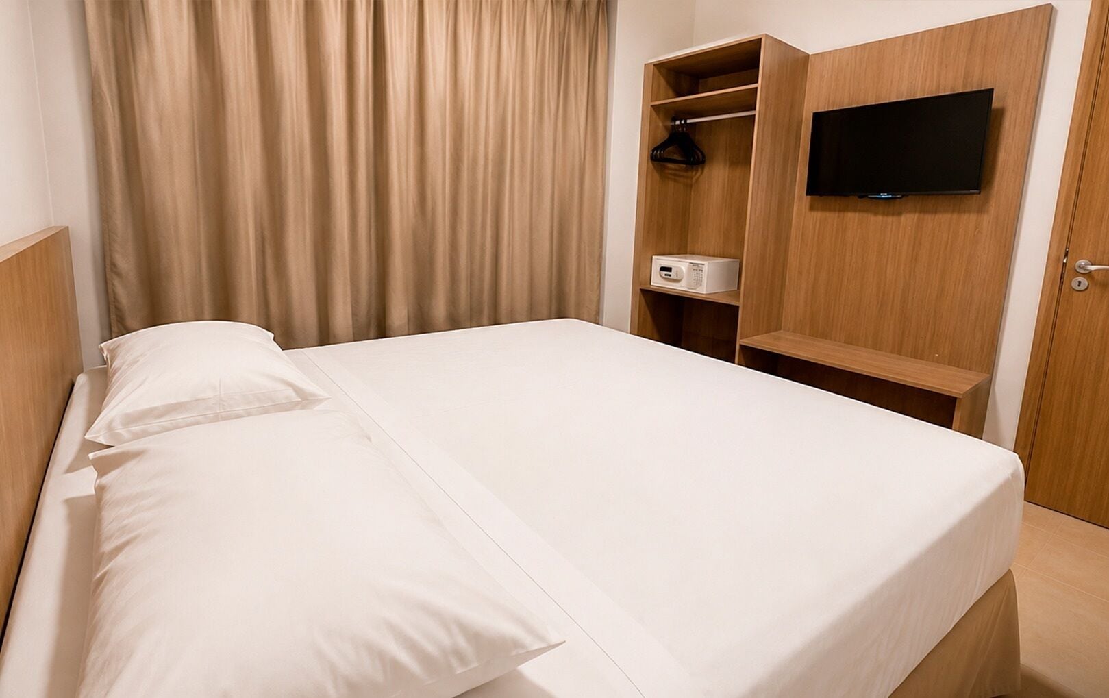 Chambre Deluxe avec lits jumeaux | Minibar, coffre-fort, rideaux d’obscurcissement