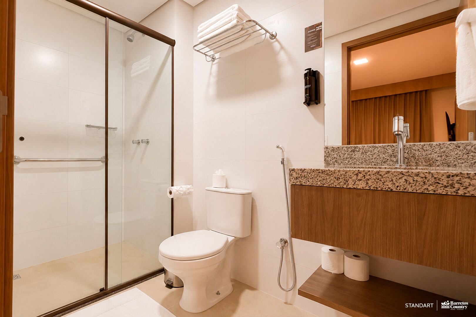 Standard Suite | Bathroom | Shower, rainfall showerhead, towels, soap