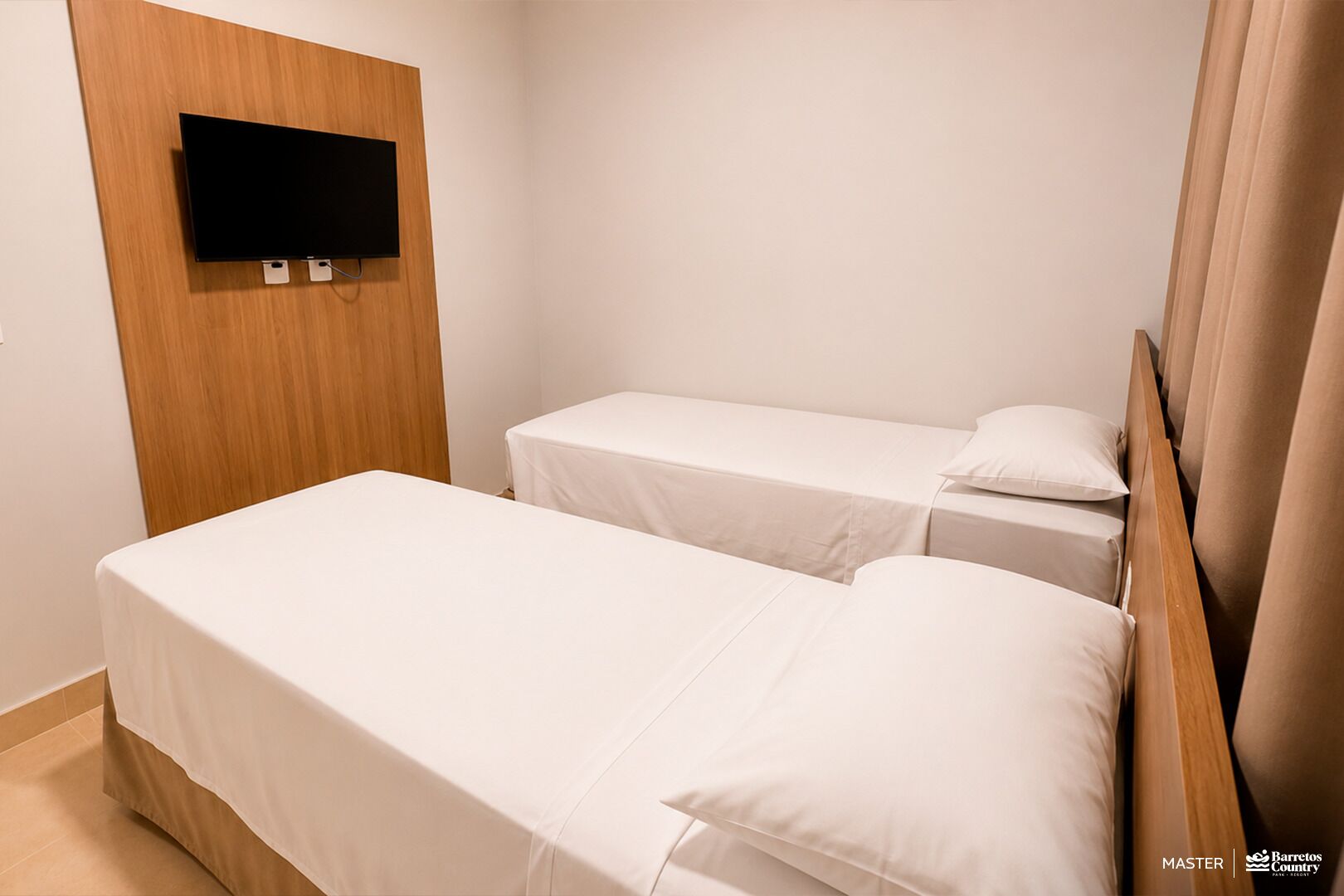 Chambre Deluxe avec lits jumeaux | Minibar, coffre-fort, rideaux d’obscurcissement