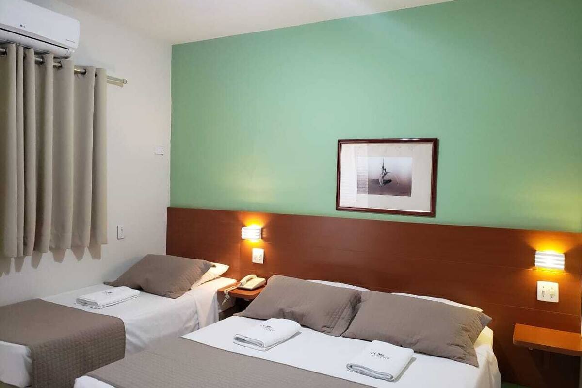 Triplo Luxo | 1 kamar tidur, minibar, meja kerja, dan tirai kedap cahaya