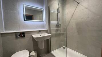 Shower, free toiletries, hair dryer, towels