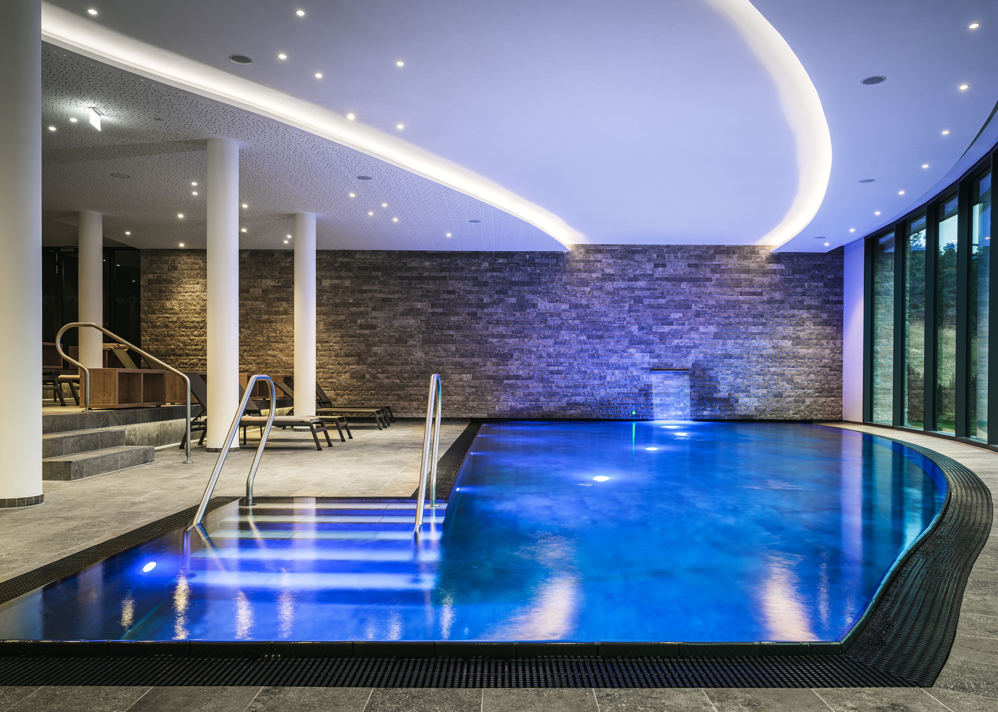indoor pool, pool loungers