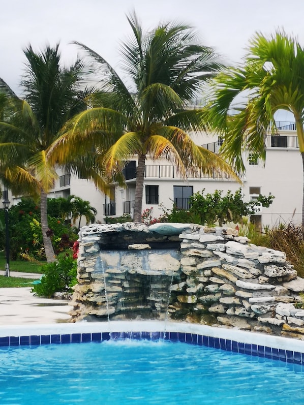 Outdoor pool, pool umbrellas, sun loungers