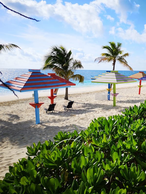 On the beach, white sand, free beach cabanas, sun loungers