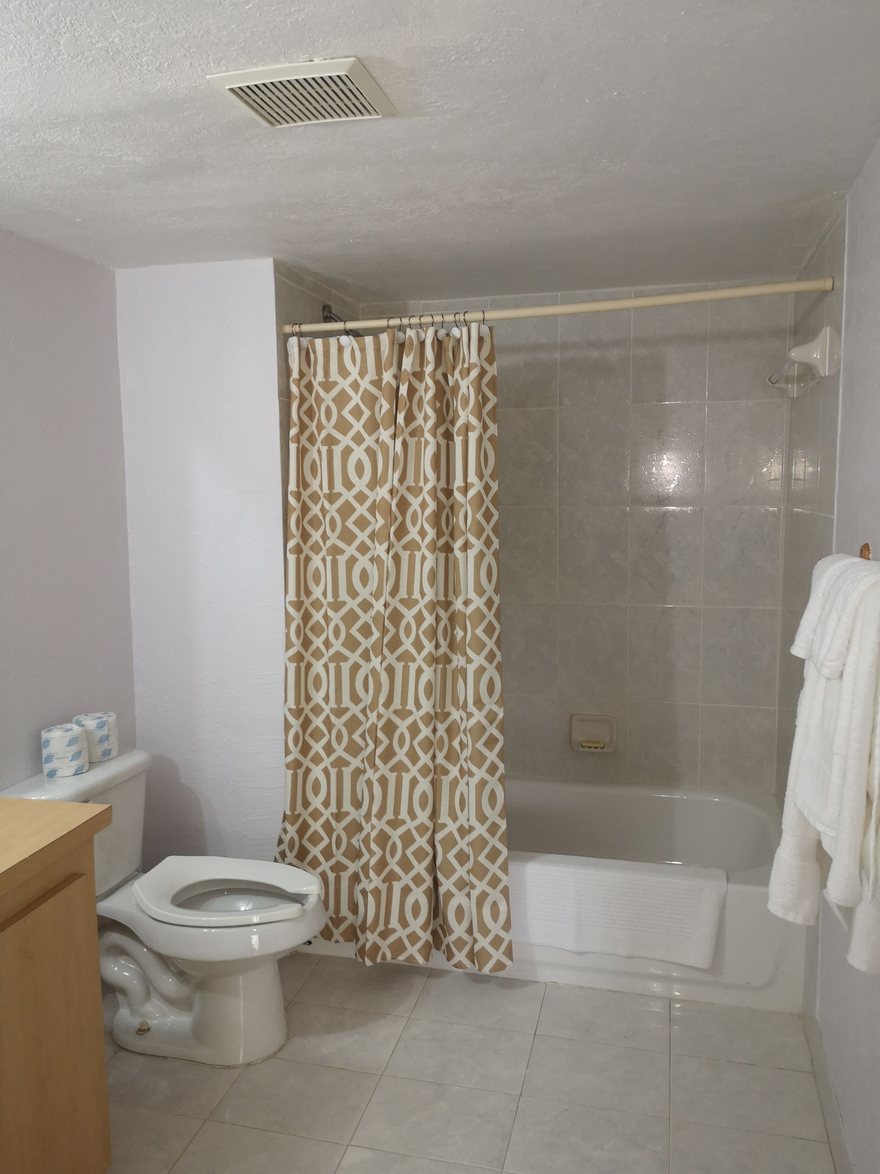 basic room, 2 queen beds, non smoking, garden view | bathroom | shower, free toiletries, towels