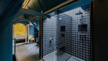 Intimate Suite | Bathroom | Shower, designer toiletries, hair dryer, towels