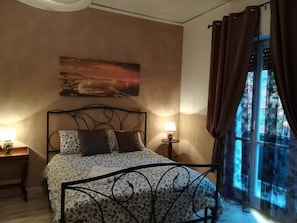 Premium bedding, down duvets, in-room safe, desk