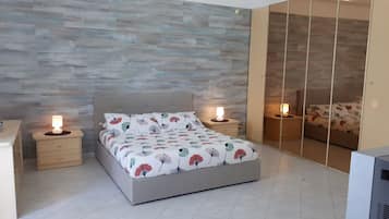 Quadruple Room, Sea View | Down comforters, in-room safe, blackout drapes, iron/ironing board