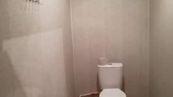 Shower, free toiletries, slippers, towels