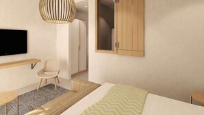 Un dormitorio moderno con una cama, una silla, un televisor, un armario y una lámpara colgante.