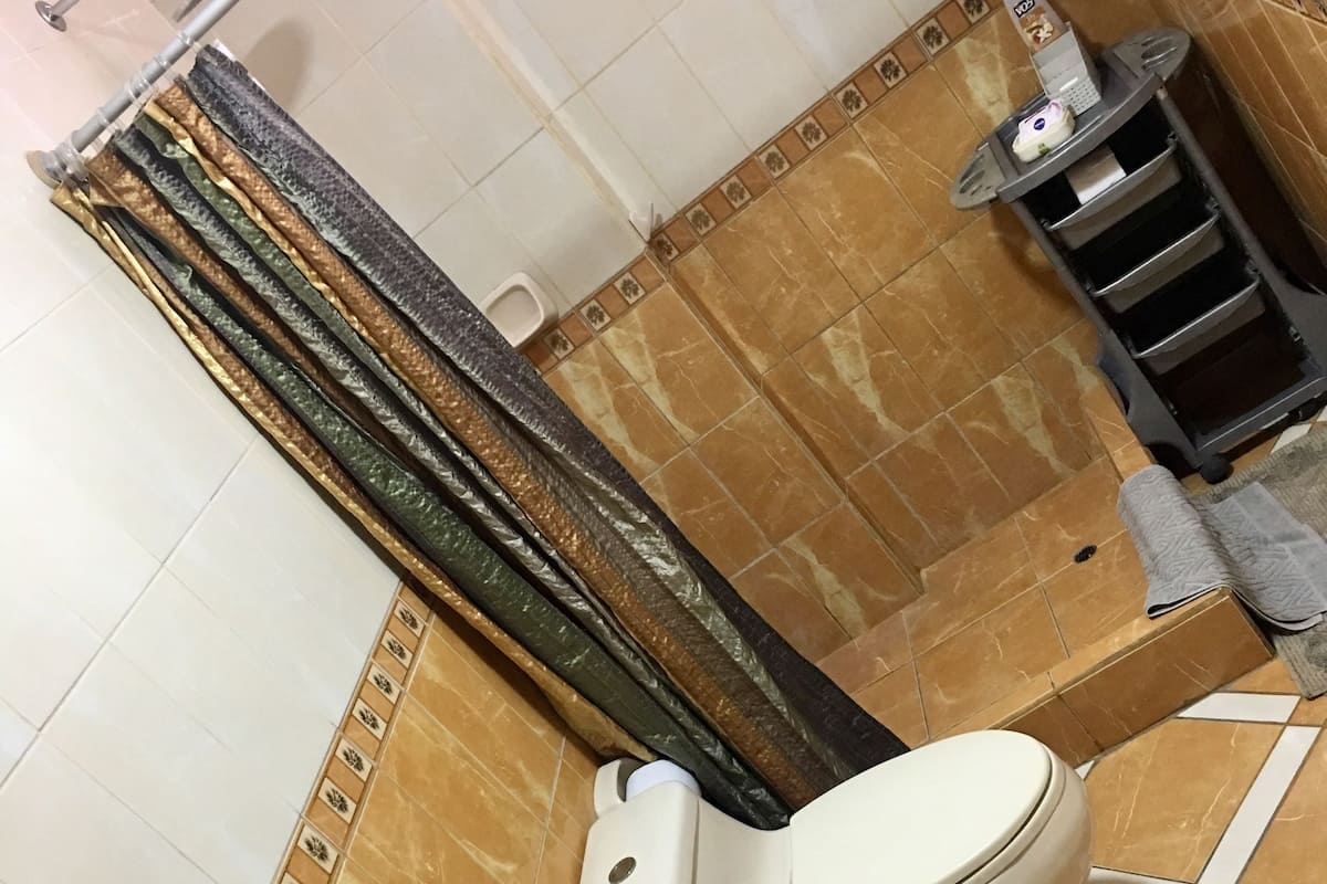 Family Apartment, 2 Bedrooms, Ground Floor | Iron/ironing board, free WiFi, bed sheets