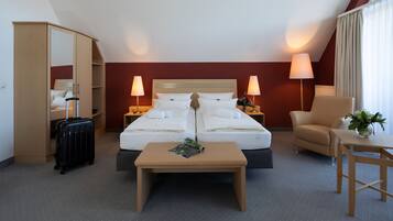 Junior Suite, City View | 1 bedroom, premium bedding, in-room safe, individually decorated