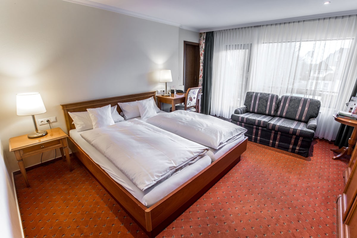 Basic Room | Hypo-allergenic bedding, in-room safe, desk, cots/infant beds
