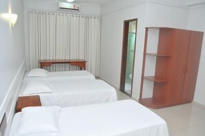 Minibar, desk, blackout drapes, iron/ironing board